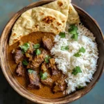 Beef Coconut Curry with Fragrant Rice and Warm Naan